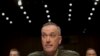 General Joseph Dunford, Commander of U.S.-led forces in Afghanistan, testifies on Capitol Hill, March 12, 2014.