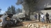 This picture taken on Nov. 18, 2019 shows the aftermath of a reported air strike on a factory south of the Libyan capital Tripoli.