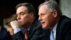 FILE - Senate Intelligence Committee Chairman Richard Burr, R-N.C., right, speaks next to Vice Chairman Mark Warner, D-Va., during a hearing on Russian election activity and technology, on Capitol Hill in Washington, Nov. 1, 2017.