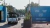 FILE - U.N. peacekeepers drive into their compound in the capital Kinshasa, in the Democratic Republic of Congo, April 10, 2017. A Malawian peacekeeper who died saving the life of a fellow soldier was honored Friday.