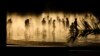 People cool down in a fountain beside Manzanares river in Madrid, Spain, June 30, 2015. 