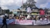 ပိတ်မိနေတဲ့ ပြည်သူတွေ လွှတ်မြောက်ရေးအတွက် ဆန္ဒထုတ်ဖော်ကြတဲ့ ခေါင်းဆောင် ၃ ဦးကို  ပြစ်ဒဏ် ချခဲ့တာကို ကန့်ကွက်ဆန္ဒပြ (Kachin Youth Movement)