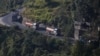 Nepalese petrol tankers heading to the Chinese border of Kerung are pictured on a road on the outskirts of Kathmandu, Nepal, Nov. 2, 2015. 