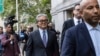 Bill Hwang, founder of Archegos Capital Management, center, leaves Manhattan federal court after the first day of his corruption trial, May, 13, 2024, in New York.
