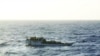 A picture released by the Australian Maritime and Safety Authority (AMSA) shows a boat which according to the AMSA was taken mid-morning before the boat sank near Christmas Island June 27, 2012.