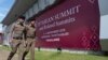 In this Tuesday, Oct. 29, 2019. Thai policemen walk in front of a banner welcoming Association of Southeast Asian Nations at the venue of The 35th annual Association of Southeast Asian Nations (ASEAN) in Nonthaburi province, Thailand. U.S. national…