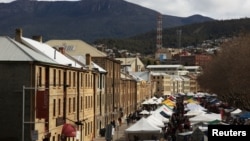 Shoppers explore the historic Salamanca Markets in Australia where a huge range of food, clothes and local crafts are on offer, August 27, 2011