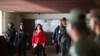 Archivo - Aida Merlano es escoltada por fuerzas de seguridad antes de una audiencia en una corte en Caracas, Venezuela, el 6 de febrero de 2020.