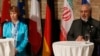 EU foreign policy chief Catherine Ashton (L) and Iranian Foreign Minister Mohammad Javad Zarif attend a news conference in Vienna, July 18, 2014.