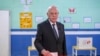 FILE - Tunisia's President Kais Saied casts his ballot during legislative elections in Tunis, Dec. 17, 2022. Saied replaced various ministers, including from the foreign and defense portfolios, the Tunisian presidency said in a statement posted on Facebook, Aug. 25, 2024.