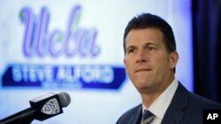 FILE - UCLA head men's basketball coach Steve Alford listens to questions during the Pac-12's NCAA college basketball media day, in San Francisco, Oct. 12, 2017. 