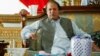 Nawaz Sharif, the leader of Pakistan Muslim League - Nawaz (PML-N), points as he speaks to foreign reporters at his residence in Lahore May 13, 2013. Sharif, who is poised for victory after Pakistan's May 11 election, said he had spoken at length with Pri