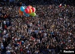 Hundreds of thousands of people attend the World Pride parade in Madrid, Spain, July 1, 2017. The 10-day festival highlighting gay rights ends Sunday.