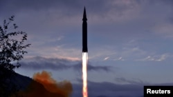 The newly developed hypersonic missile Hwasong-8 is test-fired by the Academy of Defence Science of the DPRK in Toyang-ri, Ryongrim County of Jagang Province, North Korea, in this undated photo released on September 29, 2021 by North Korea's Korean Central News Agency (KCNA). 