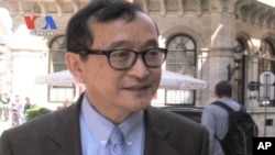Sam Rainsy remains in exile, facing a raft of criminal charges he says are politically motivated.