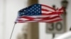 An American flag waves in wind from Hurricane Matthew in St. Augustine, Florida, Oct. 7, 2016.