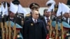 Президент России Владимир Путин, в центре, принимает участие в церемонии возложения венков к могиле Неизвестного солдата после военного парада в честь Дня Победы в Москве, Россия, в четверг, 9 мая 2024 года