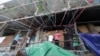 FILE PHOTO - Residents of Borei Keila community watched on as their building is being torn down, Phnom Penh, Cambodia. (Leng Len/VOA Khmer)