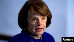 Senate Intelligence Committee Chair Sen. Dianne Feinstein speaks with reporters on Capitol Hill, March 5, 2013, after a closed-door committee vote on CIA director nominee John Brennan.