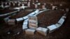 Graves of Kurdish people killed fighting alongside People's Protection Units (YPG) against Islamic State (IS) jihadists for the control of the mainly-Kurdish Syrian town of Kobani, also known as Ain al-Arab, in the cemetery of the Turkish town of Suruc, o