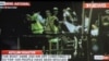 Screen grab shows asylum-seeker survivors arriving at Christmas Island after their boat capsized 120 nautical miles north of Christmas Island, 2,600 kilometres (1,600 miles) from the Australian mainland, June 22, 2012 