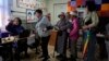 Voters register at a polling station in Ulaanbaatar, Mongolia, on June 28, 2024. Voters in Mongolia are electing a new parliament on Friday in their landlocked democracy that is squeezed between China and Russia, two much larger authoritarian states