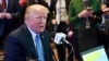 FILE - President Donald Trump sits for a radio interview in the Eisenhower Executive Office Building in the White House complex in Washington, Oct. 17, 2017.