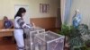 Wata mata tana kada kuri'arta a zaben 'yan majalisu ranar 21 ga wata Yulin 2019. REUTERS
