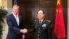 Acting U.S. Defense Secretary Patrick Shanahan and Chinese Defense Minister Wei Fenghe meet before the start of their meeting in Singapore on the sidelines of the Shangri-La dialogue, May 31, 2019. 