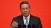 China's Premier Li Qiang delivers a speech during the China Developm.ent Forum in Beijing, March 24, 2024. After days of delay, Li congratulated new British Prime Minister Keir Starmer on his election.