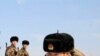 Tentara Tiongkok berlatih di Hami, provinsi Xinjiang (1/12). Warga minoritas Uighur yang beragama Islam menjadi mayoritas penduduk provinsi ini.