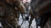 Fighters of the Azov Battalion prepare to fire an anti-tank weapon in the town of Shyrokyne, eastern Ukraine, March 23, 2015. 