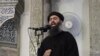 FILE - Image taken from video shows a man purported to be Abu Bakr al-Baghdadi, leader of the Islamic State militant group, delivering a sermon. In an audio recording released late Tuesday, he called on IS fighters in Mosul not to retreat in the face of approaching Iraqi and Kurdish forces.