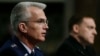 U.S. Navy Vice Admiral Michael Rogers (R) and U.S. Air Force General Paul Selva attend the Senate Armed Services Committee confirmation hearing on Capitol Hill in Washington, March 11, 2014.