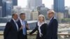 Australia's Foreign Minister Bob Carr (R) and Australian Defense Minister Stephen Smith (2nd L) talk with U.S. Secretary of State Hillary Clinton (2nd R) and U.S. Defense Secretary Leon Panetta (L) in Perth, November 14, 2012. 