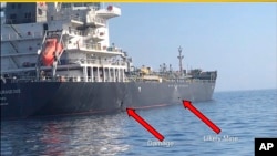 Image released by the U.S. military's Central Command, shows damage and a suspected mine on the Kokuka Courageous in the Gulf of Oman near the coast of Iran, June 13, 2019.