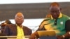 Newly-elected ruling African National Congress (ANC) party president, Cyril Ramaphosa, right, and former ANC president and South African President Jacob Zuma, left, attend the party's 106th birthday celebrations in East London, South Africa, Jan. 13, 2018.