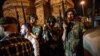 Turkish solders stay with weapons at Taksim Square as people protest against the military coup in Istanbul, July 16, 2016. 