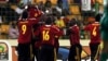 Les joueurs angolais célèbrent après avoir marqué contre le Burkina Faso lors de leur match de football de la Coupe d'Afrique des Nations au stade de Malabo, le 22 janvier 2012.