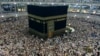 FILE - Muslim pilgrims circle the Kaaba, the black cube at center, inside the Grand Mosque during the annual pilgrimage, known as the hajj, in the Muslim holy city of Mecca, Saudi Arabia. 