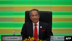 FILE - Malaysia's Prime Minister Muhyiddin Yassin takes part in the online Asia-Pacific Economic Cooperation leaders' summit in Kuala Lumpur on Nov. 20, 2020. (Reuters)