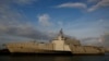FILE - This Nov. 30, 2016, file photo shows the USS Gabrielle Giffords, a Naval littoral combat ship built at the Austal USA shipyards, docked on the Mobile River in Mobile, Ala.