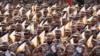 FILE - Iran's Revolutionary Guard members march during an annual military parade outside Tehran, Iran, Sept. 22, 2023. 