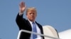 President Donald Trump waves as he boards Air Force One for a trip to West Virginia for a "Salute to Service" dinner, July 3, 2018, at Andrews Air Force Base, Maryland.