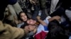 Police detain Indian youth protesting the release of a minor convicted in a fatal 2012 gang rape in New Delhi, India, Dec.20, 2015. 
