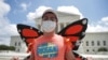 DACA recipient Luis Zuluaga celebrates outside the U.S. Supreme Court 