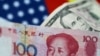 FILE - U.S. dollar and China yuan notes are seen in this illustration, June 2, 2017. This June, the yuan is set for its biggest monthly fall on record.