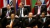 Russia's Prime Minister Dmitry Medvedev, top left, Poland's Prime Minister Donald Tusk, top center, Singapore's Prime Minister Lee Hsien Loong, top right, Laos' President Choummaly Sayasone, bottom left, China's Premier Wen Jiabao, bottom center, and Cambodia's Prime Minister Hun Sen take part in the opening ceremony for the ASEM Summit in Vientiane, Laos, Monday, Nov. 5, 2012. (AP Photo/Sakchai Lalit)