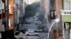 FILE - Damage is seen after clashes between the Libyan military and Islamic militias in Benghazi, Libya, Oct. 29, 2014.