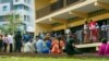 (Archives) Des électeurs font la queue pour voter lors d'un référendum sur une nouvelle Constitution, à Libreville, au Gabon, le samedi 16 novembre 2024.